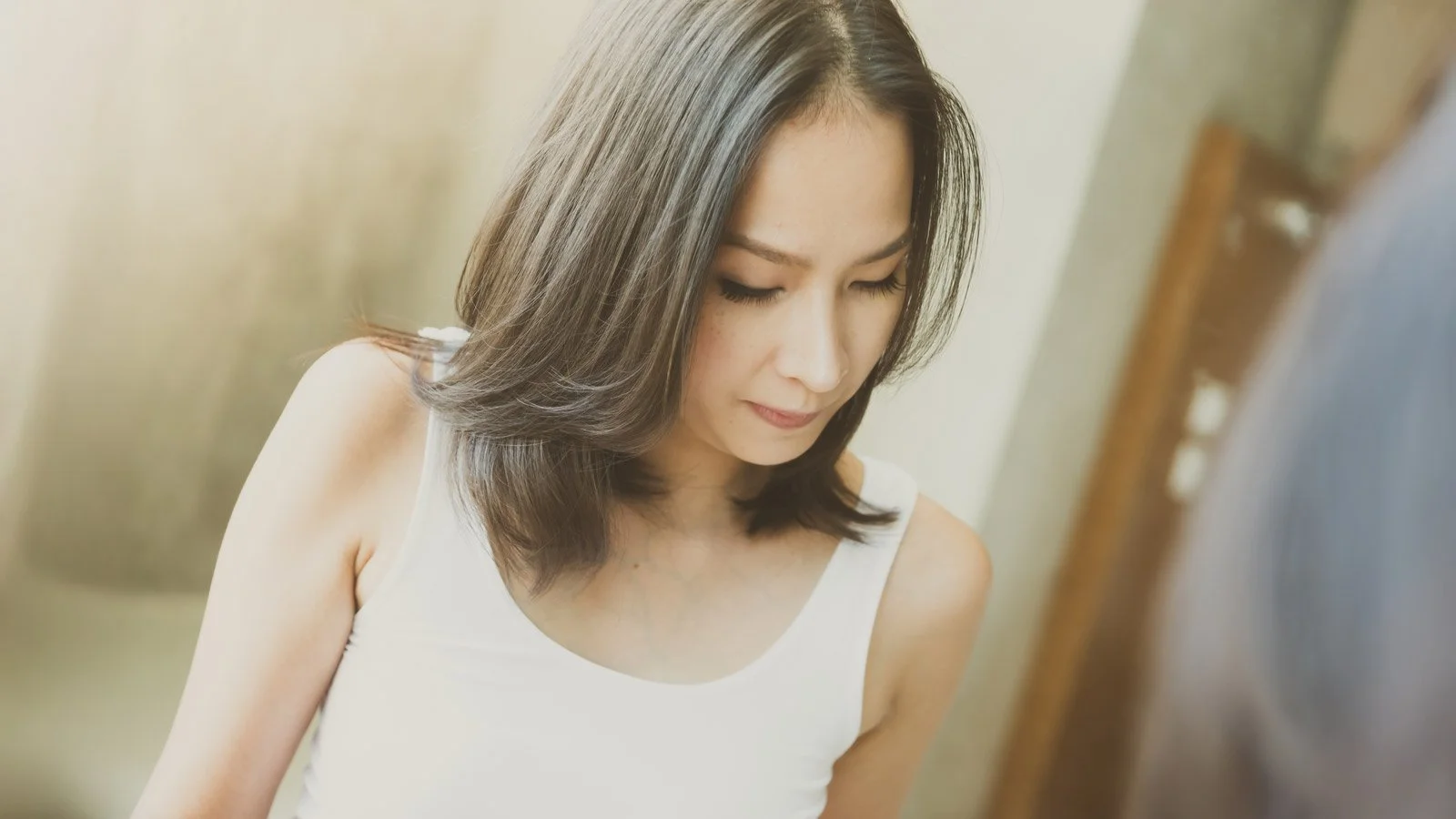 Mature Asian woman with thick hair